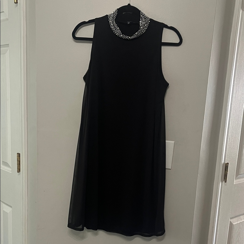 Elegant Black Mini Dress with Embellished Neckline